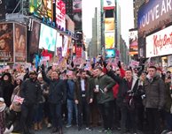 1,000 DMU students gather in New York's Times Square to fly the flag for global unity