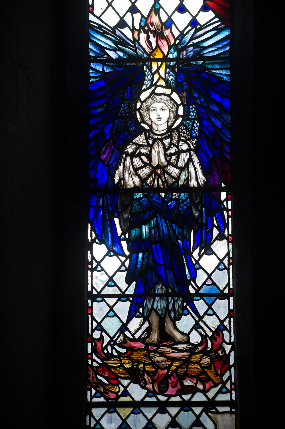 Detail of Cherubim and Seraphim, Trinity Chapel's stained glass windows, Christopher Whall, 1905