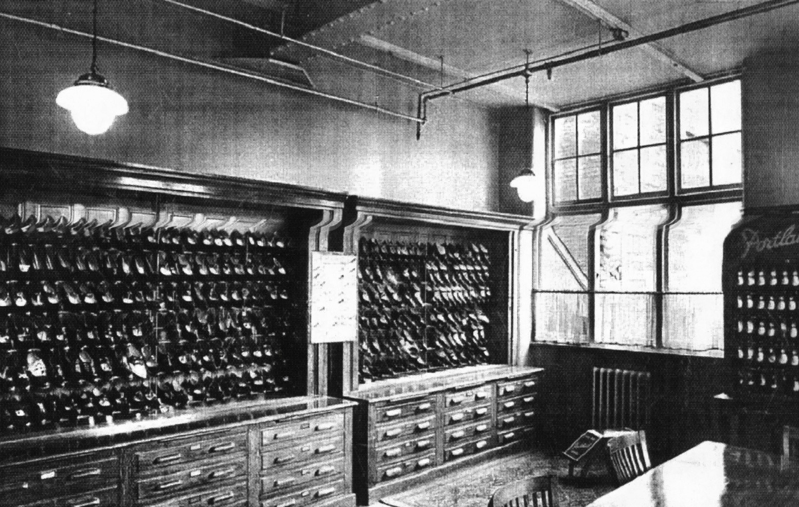 Portland Shoe factory sample room. Staff working at sewing machines in Portland Shoe Factory. Image courtesy of the Record Office of Leicester Leicestershire and Rutland 