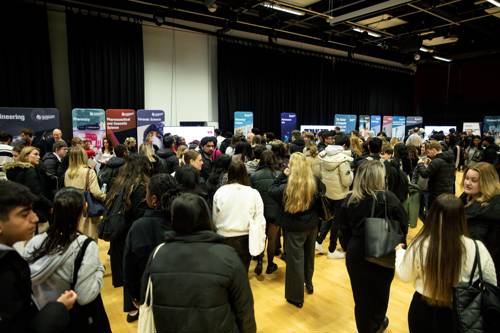 Big group of prospective students exploring the different stands at the DMU futures fair